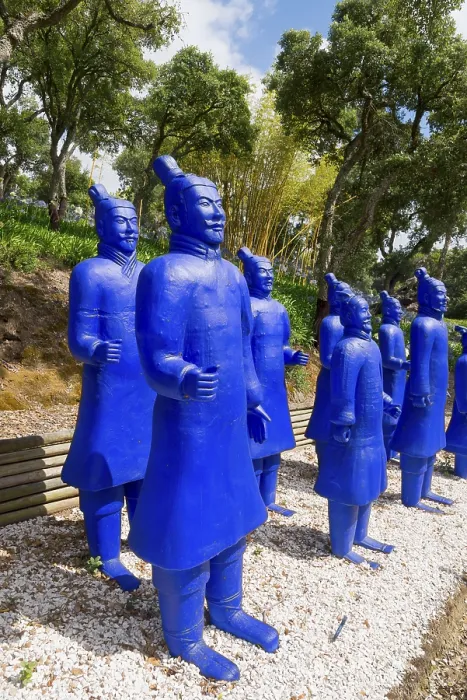 Framed Print : Several blue terracotta soldier statues stand on gravel