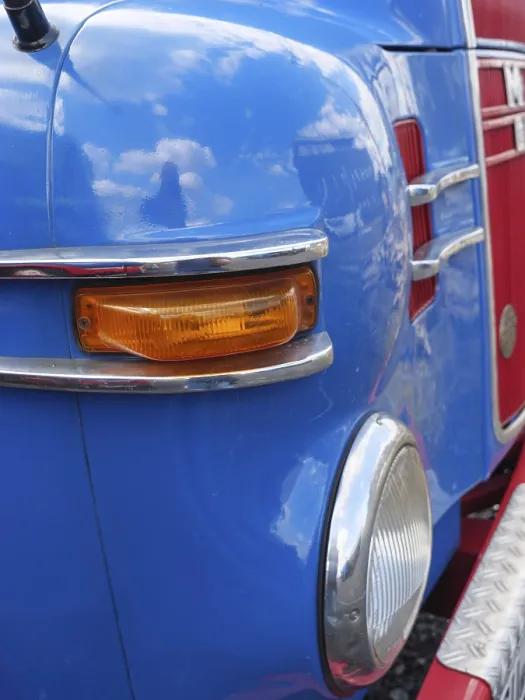 Framed Print : Blue vintage MAN with stylish headlights and chrome details