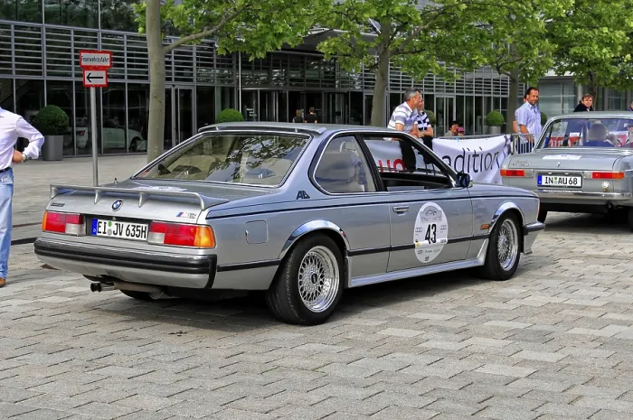 Framed Print : BMW 635 CSI, rear view of a silver BMW classic car at a rally