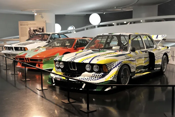 Framed Print : BMW Art Cars, BMW 635CSi of 1986 by Robert Rauschenberg at the back Framed Print : BMW Art Cars, BMW 635CSi of 1986 by Robert Rauschenberg at the back