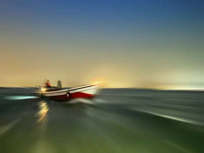 Framed Print : Boat on the lagoon off Venice, zoom effect Framed Print : Boat on the lagoon off Venice, zoom effect