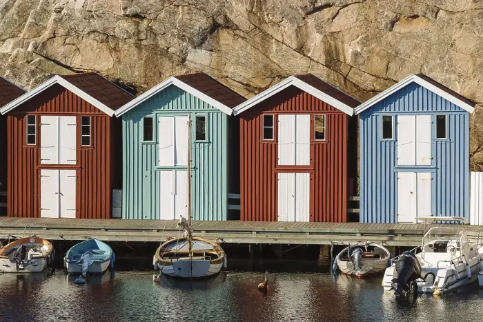 Framed Print : Boats and colourful boathouses in the harbour of Smoegen
