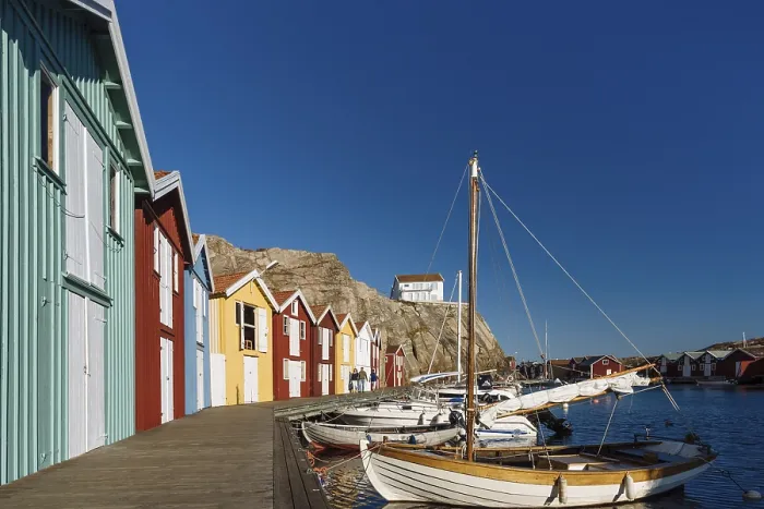 Framed Print : Boats and colourful boathouses in the harbour of Smoegen