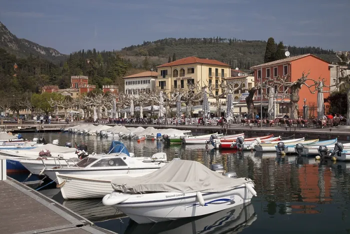 Framed Print : Boats moored in the harbour, promenade with Villa Albertini