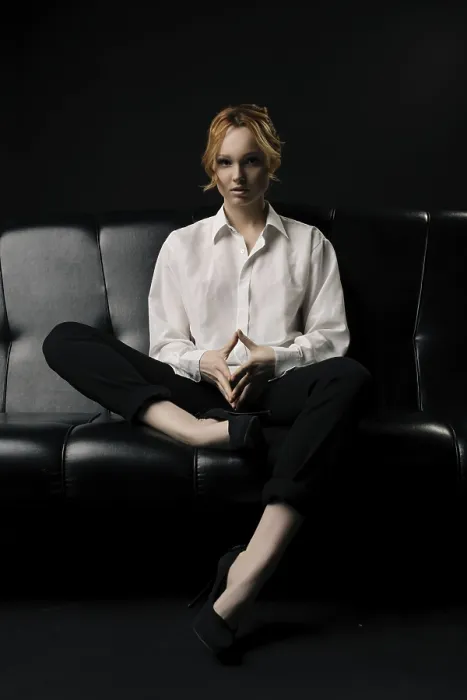 Framed Print : Full body of confident serious young female manager with ginger hair in elegant white shirt sitting on comfortable Framed Print : Full body of confident serious young female manager with ginger hair in elegant white shirt sitting on comfortable