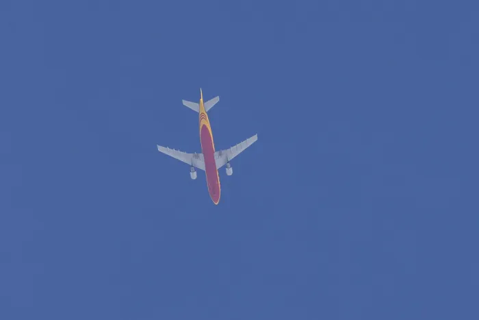 Framed Print : Boeing 767 jet aircraft of DHL cargo airlines in flight in a blue sky Framed Print : Boeing 767 jet aircraft of DHL cargo airlines in flight in a blue sky