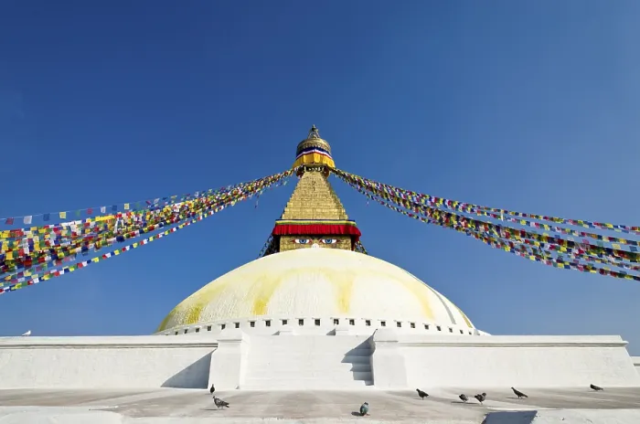 Framed Print : Boudnath Stupa with prayer flags against blue sky Framed Print : Boudnath Stupa with prayer flags against blue sky