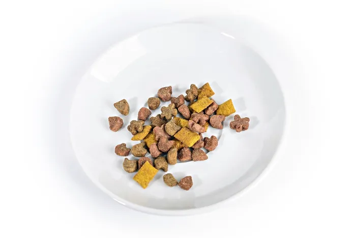 Framed Print : Bowl of pets food on a white background