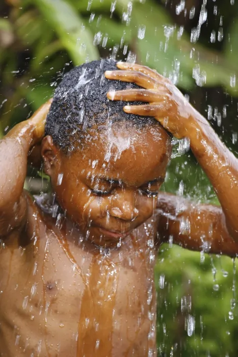 Framed Print : Boy, 6 years, under a shower, Bamenda Framed Print : Boy, 6 years, under a shower, Bamenda