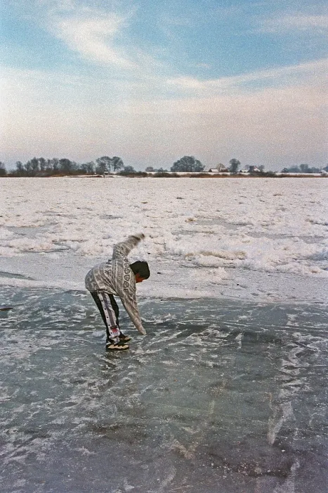 Framed Print : Boy on ice rink, frozen Elbe, Bleckede