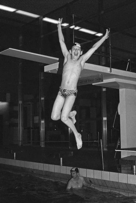 Framed Print : Boy jumping from the three-metre board