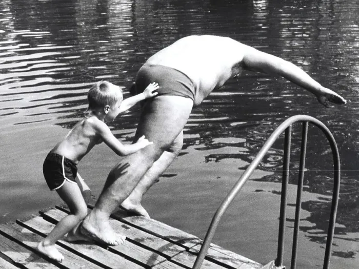Framed Print : Boy throws man in the water ca