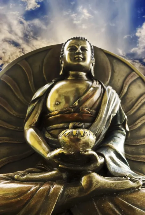 Framed Print : Brass Buddha statue with a serene expression under a cloudy sky Framed Print : Brass Buddha statue with a serene expression under a cloudy sky