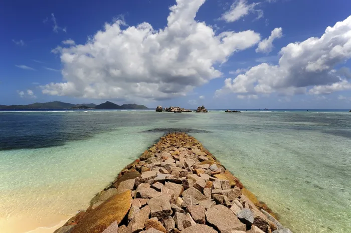 Framed Print : Breakwater in front of the harbour of La Passe Framed Print : Breakwater in front of the harbour of La Passe