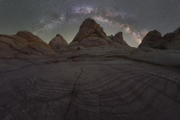 Framed Print : A breathtaking night sky view featuring the Milky Way over textured rock formations in the Utah desert