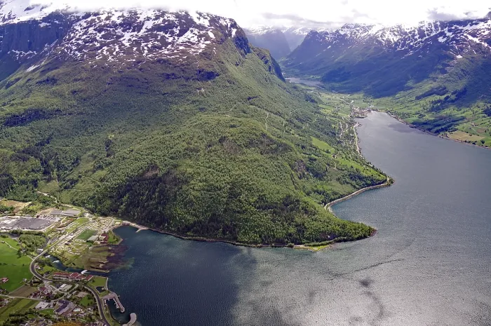 Framed Print : Breathtaking panorama of a fjord with snow-capped mountains and dense forests