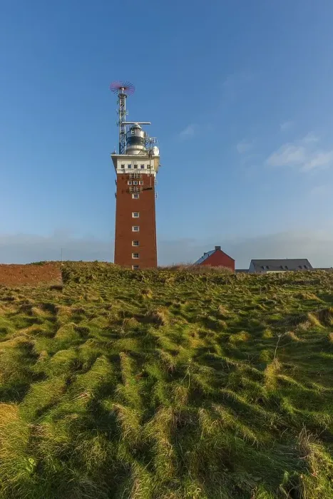 Framed Print : Brick lighthouse with radar antenna