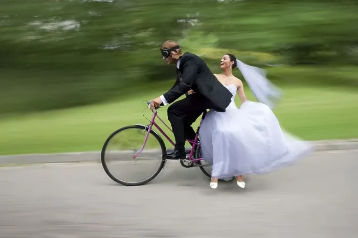Framed Print : Bride and groom, bridal couple riding a bicycle