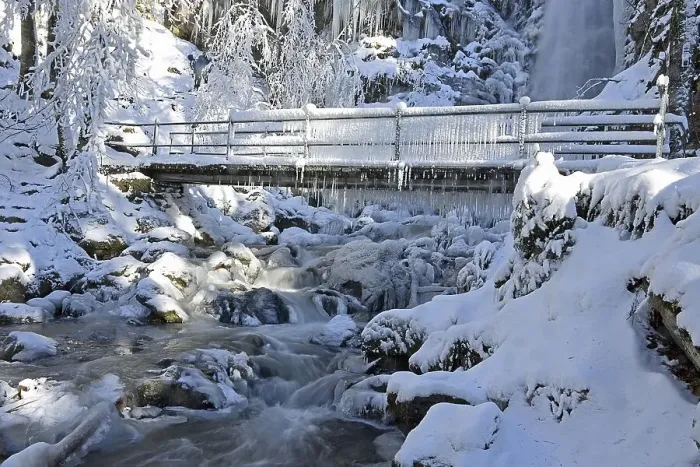 Framed Print : Bridge with icicles and frozen stream