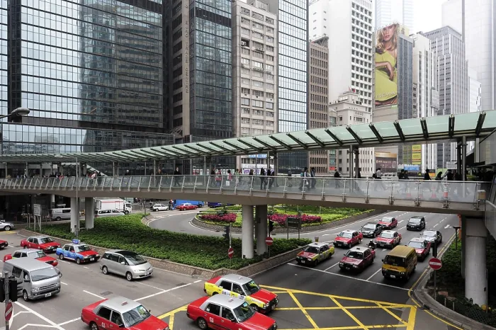 Framed Print : Bridge for pedestrians at an intersection of two roads