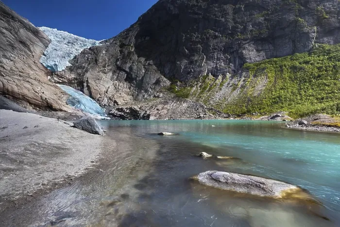 Framed Print : Briksdalsbreen Glacier tongue with a glacial lake