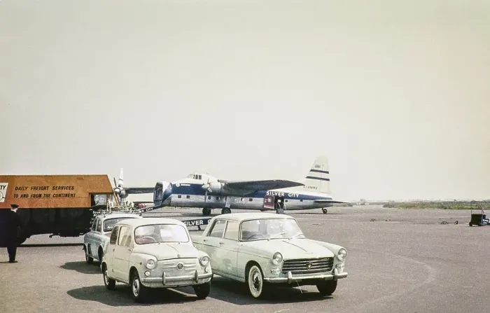 Framed Print : Bristol Superfreighter aircraft G AMWE, Silver City Airways airline air ferry, Ferryfield airport, Lydd airfield, Kent England, UK 1960 brand new Peugeot 404 saloon and Fiat 600 cars Framed Print : Bristol Superfreighter aircraft G AMWE, Silver City Airways airline air ferry, Ferryfield airport, Lydd airfield, Kent England, UK 1960 brand new Peugeot 404 saloon and Fiat 600 cars