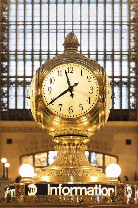 Framed Print : Bronze clock above the information desk Framed Print : Bronze clock above the information desk