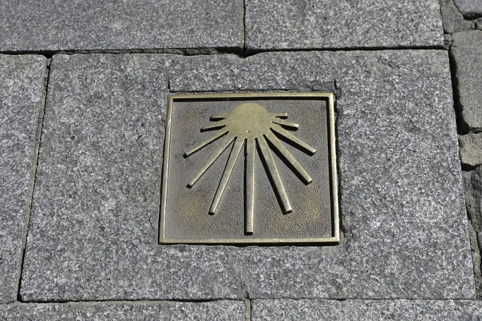 Framed Print : Bronze plaque with signs of the scallop