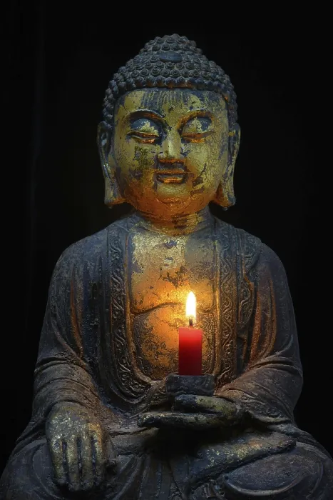 Framed Print : Buddha with burning candle