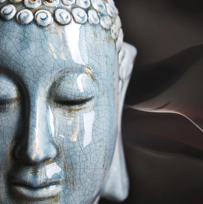 Framed Print : Buddha close up portrait over dark background Framed Print : Buddha close up portrait over dark background