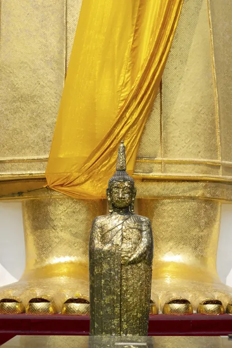 Framed Print : Buddha figure decorated with gold leaf in front of a 32 metre high standing Buddha statue Framed Print : Buddha figure decorated with gold leaf in front of a 32 metre high standing Buddha statue