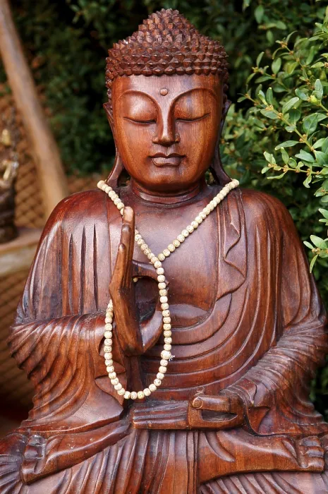 Framed Print : Buddha figure wearing a necklace at a garden exhibition Framed Print : Buddha figure wearing a necklace at a garden exhibition