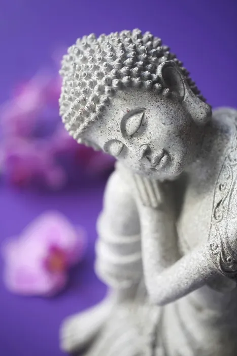 Framed Print : Buddha Figurine With Orchids In The Background