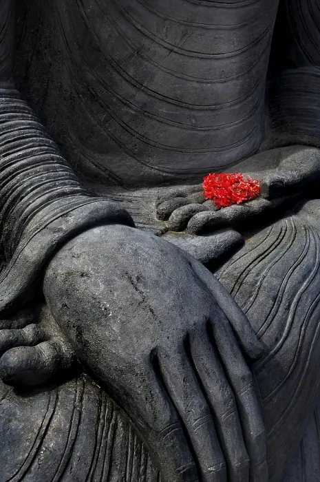Framed Print : Buddha statue, hands with blossom in a stonemason's workshop near Ubud Framed Print : Buddha statue, hands with blossom in a stonemason's workshop near Ubud
