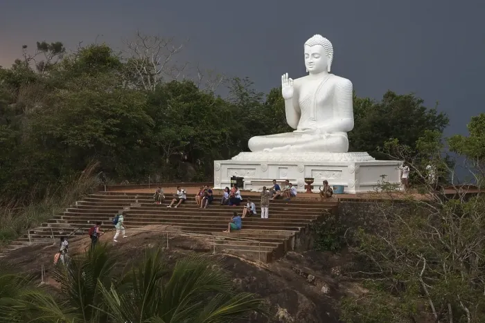 Framed Print : Buddha statue, Seated Buddha, stormy atmosphere Framed Print : Buddha statue, Seated Buddha, stormy atmosphere