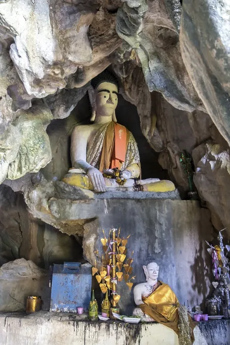 Framed Print : Buddha statue sitting in a cave