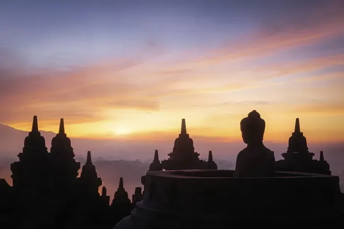 Framed Print : Buddha statue at sunrise, Borobudur temple complex