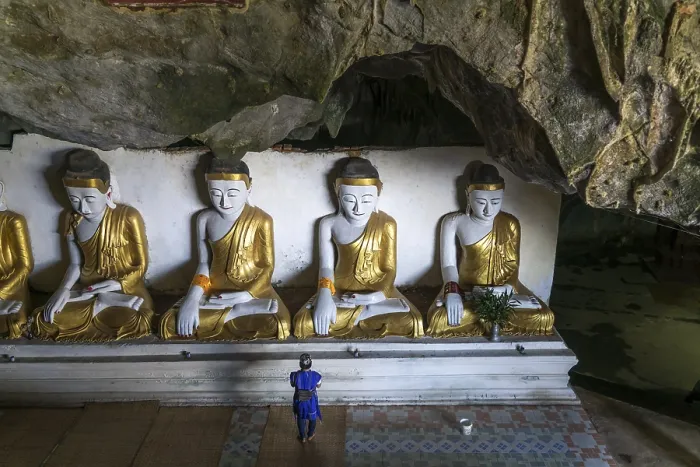 Framed Print : Buddha statues in the Kawgun Cave