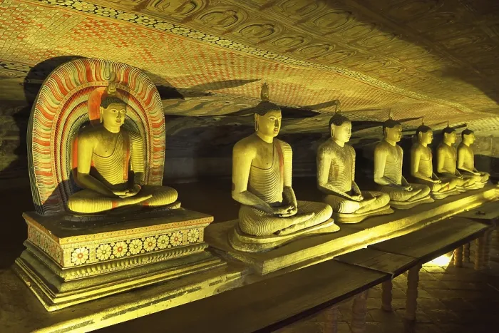 Framed Print : Buddha statues and murals in one of the cave temples of the Golden Temple