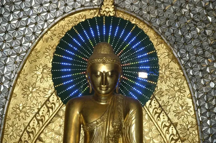 Framed Print : Buddhist figure in gold with blue nimbus Framed Print : Buddhist figure in gold with blue nimbus