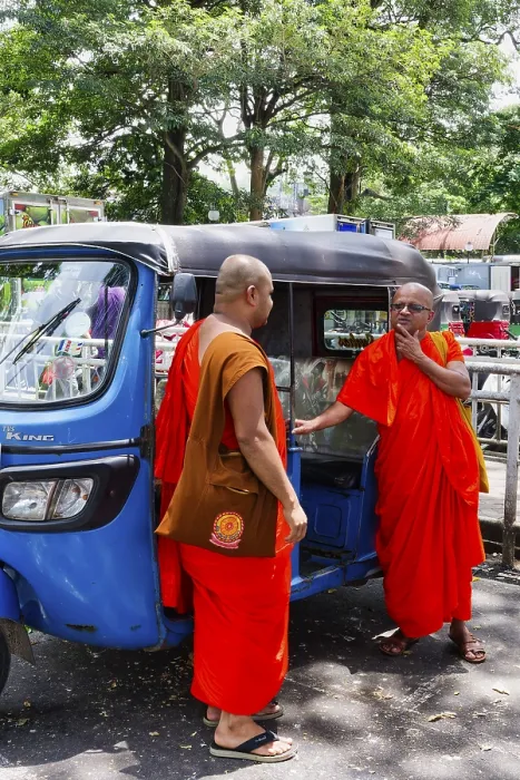 Framed Print : Buddhist monks talking near a tuk-tuk