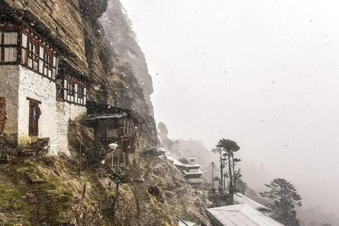 Framed Print : Buddhist nunnery in the mountains during snowfall