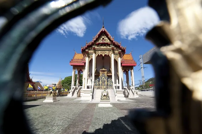 Framed Print : Buddhist pagoda, part of temple complex under blue sky