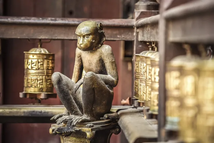 Framed Print : Buddhist Prayer Wheels, Monkey Framed Print : Buddhist Prayer Wheels, Monkey
