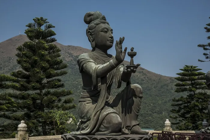 Framed Print : Buddhist statue praising Tian Tan Buddha or the Big Buddha Framed Print : Buddhist statue praising Tian Tan Buddha or the Big Buddha