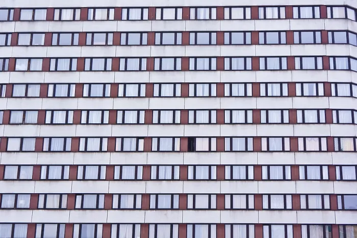 Framed Print : Building facade with a grid of windows creating a repetitive pattern Framed Print : Building facade with a grid of windows creating a repetitive pattern