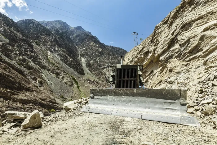 Framed Print : Bulldozer doing mountain road construction in Himalayas