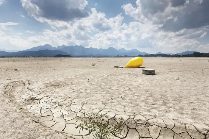 Framed Print : Buoy in the waterless Forggensee in Ostallgaeu