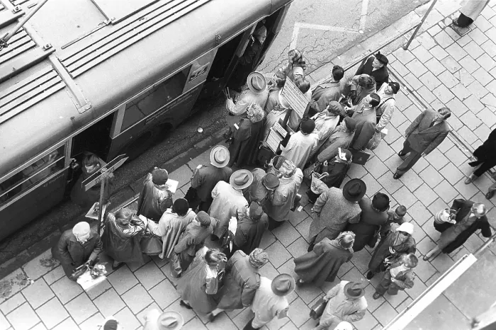 Framed Print : Bus stop in Stockholm in 1953. People are waiting for the bus at the bus stop. Bus 32 travelling on the Fleminggatan-Fridhemsplan line has stopped and people have started to get on the bus