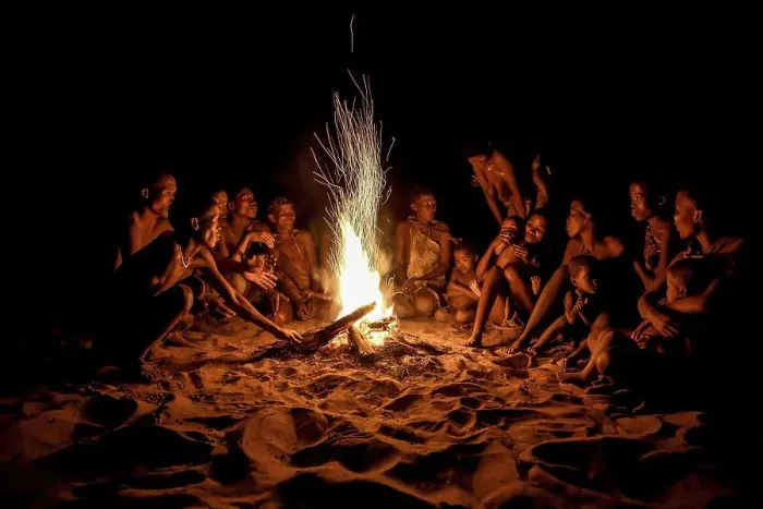 Framed Print : Bushmen of the Ju /  Hoansi-San sitting at the campfire